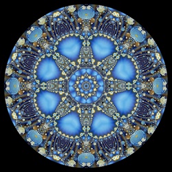 This dynamic fractal mandala with shades of blue, cyan, gold, beige, and brown is suggestive of the night sky and mysticism.